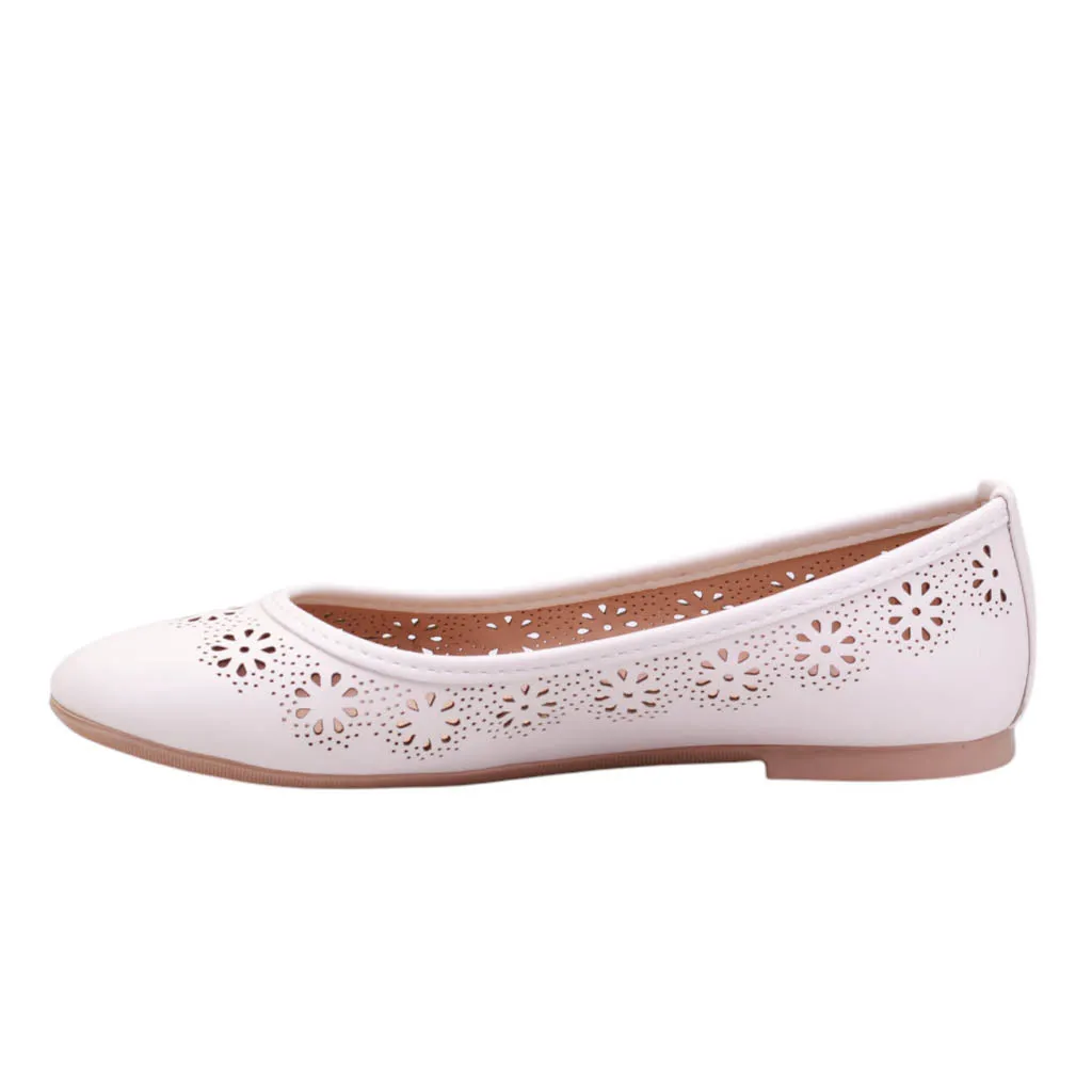 Flats para dama de corte con perforaciones y punta redonda