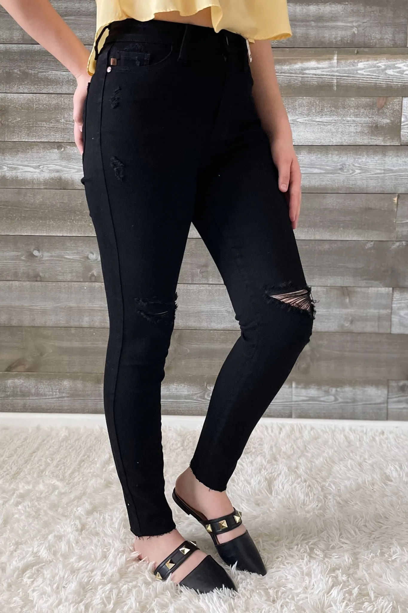 Judy Blue Black Skinny Jeans with Heavy Distressing and Raw Hem