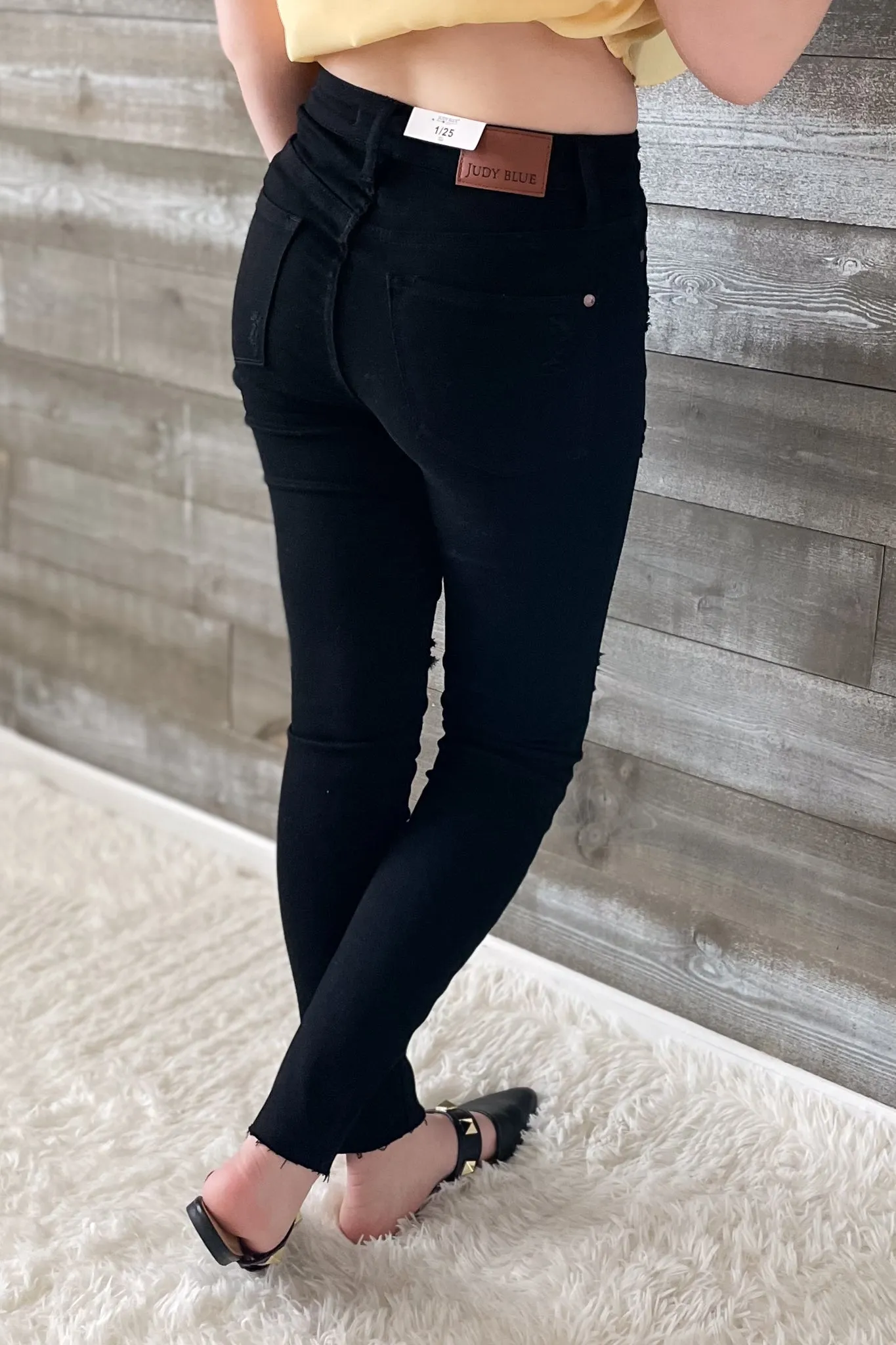 Judy Blue Black Skinny Jeans with Heavy Distressing and Raw Hem