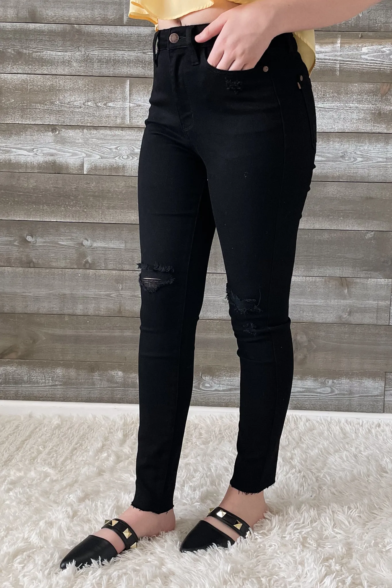 Judy Blue Black Skinny Jeans with Heavy Distressing and Raw Hem