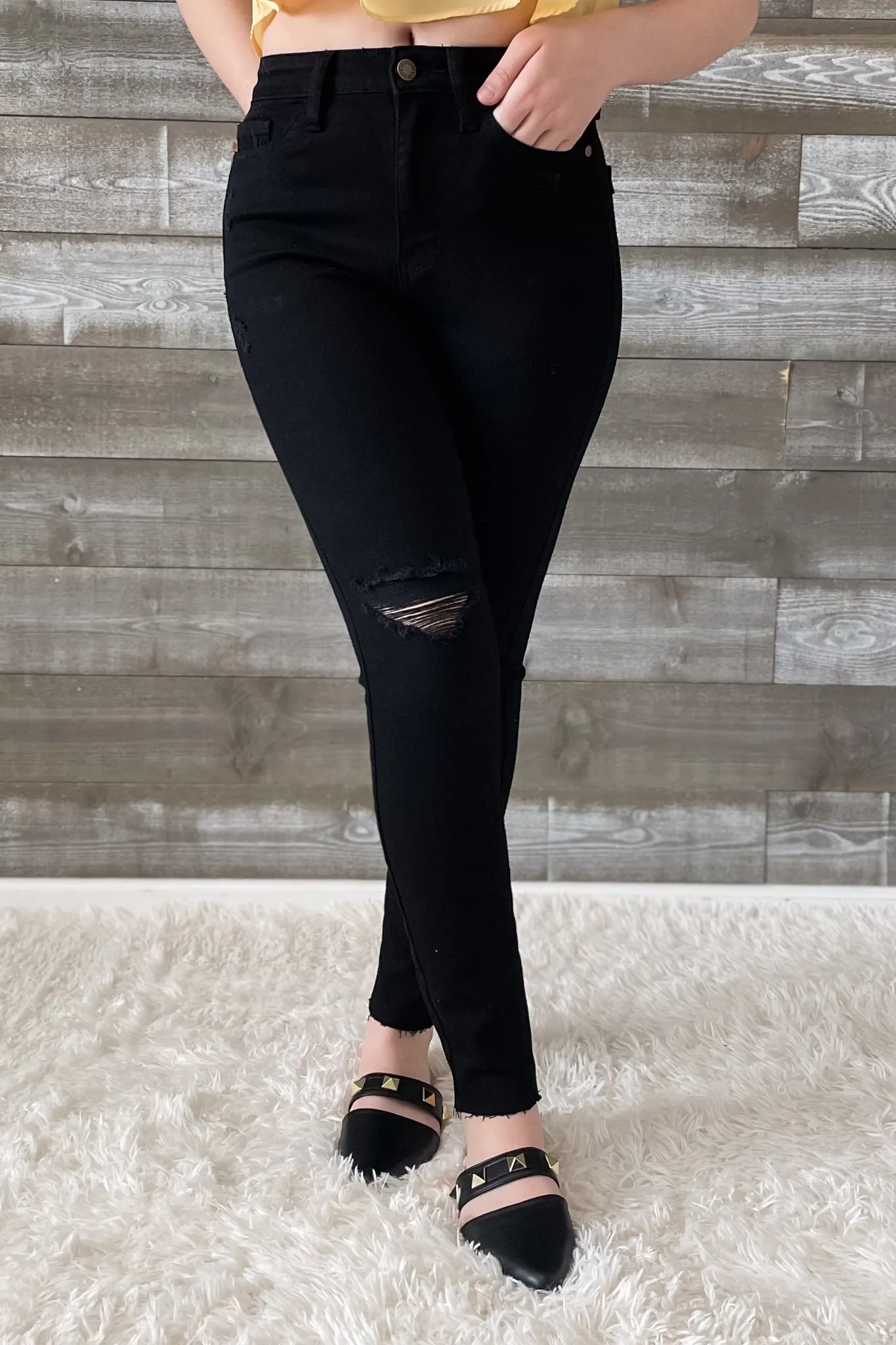 Judy Blue Black Skinny Jeans with Heavy Distressing and Raw Hem