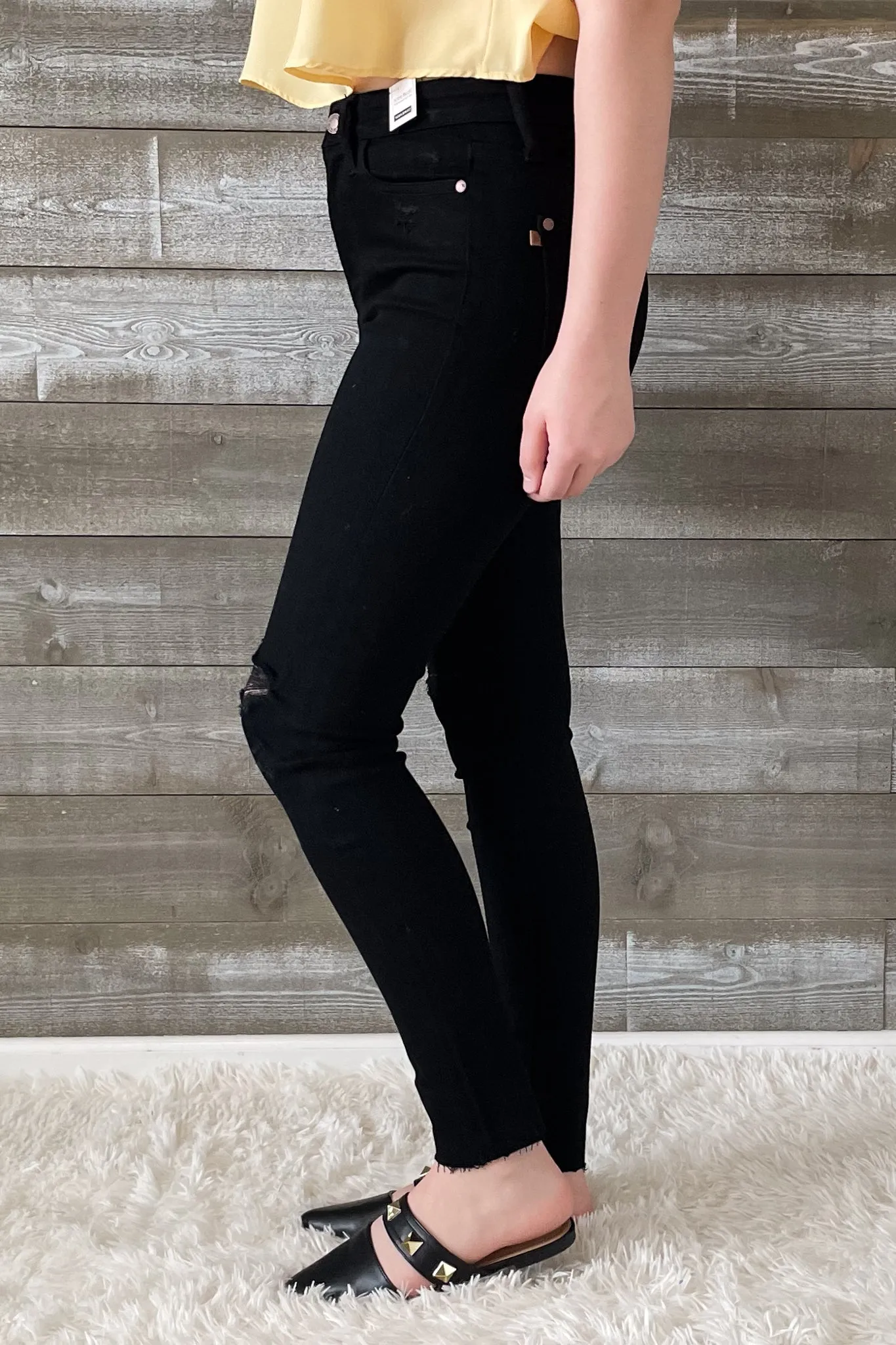 Judy Blue Black Skinny Jeans with Heavy Distressing and Raw Hem