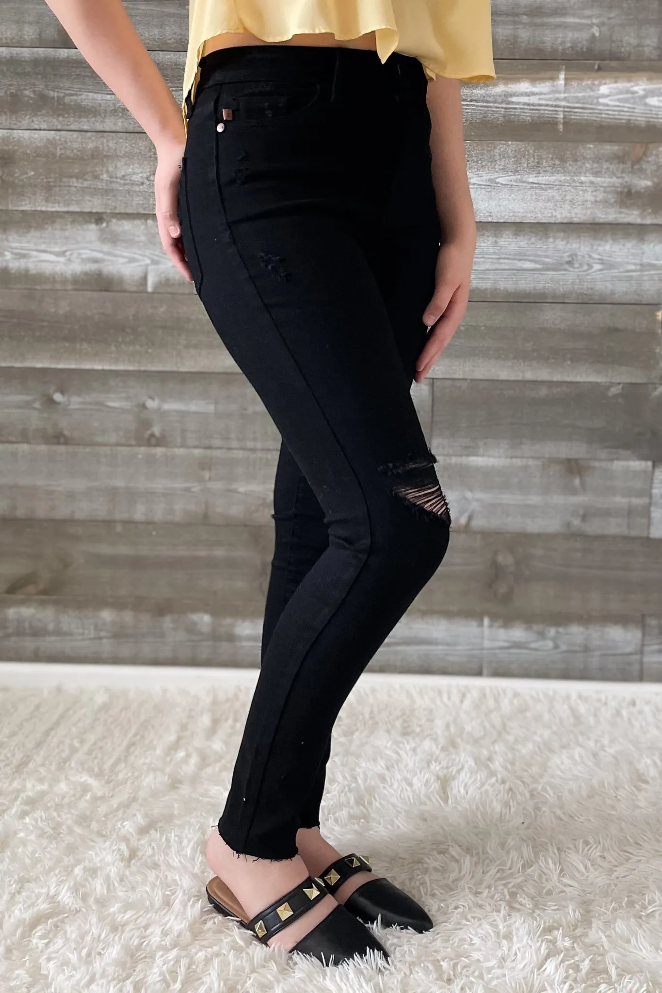 Judy Blue Black Skinny Jeans with Heavy Distressing and Raw Hem